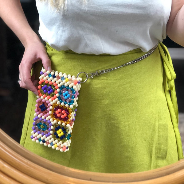 Beaded cellphone bag worn as a fanny pack